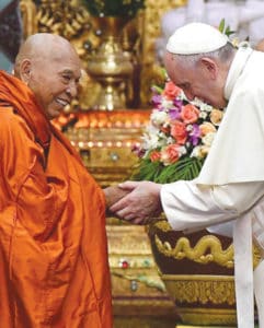 The Pope meeting a Budhist monk. source: Getty Images